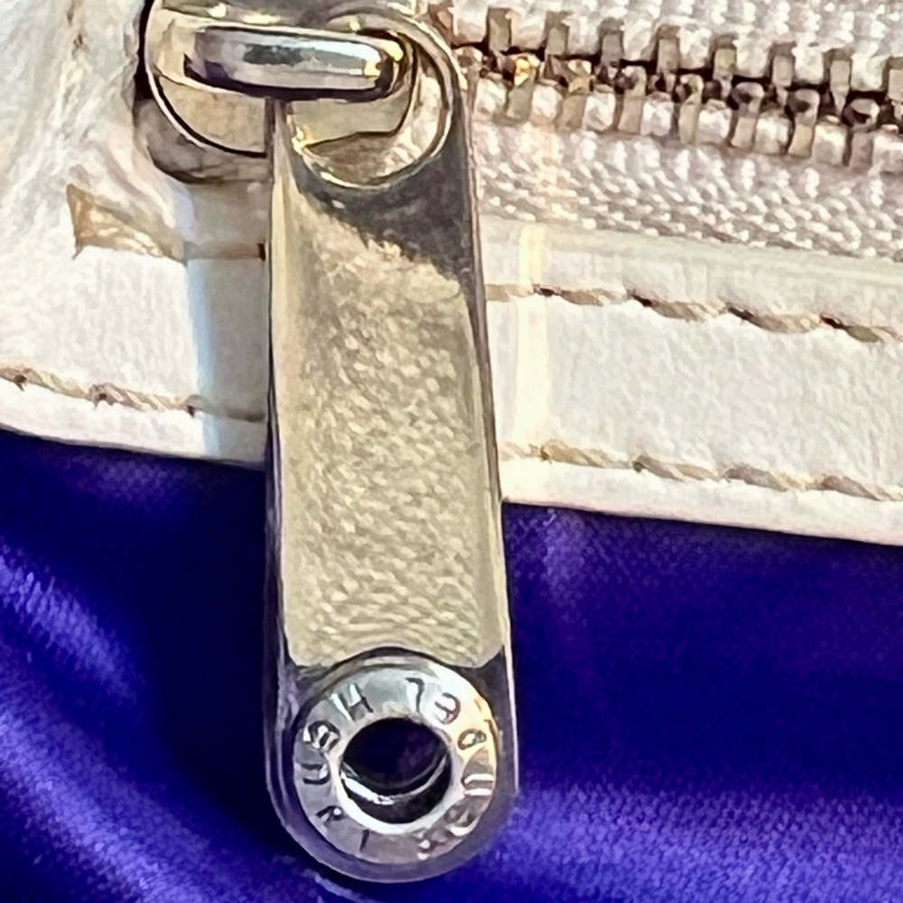 Henri Bendel Jetsetter convertible backpack with purple interior lining. - Picture 13 of 15
